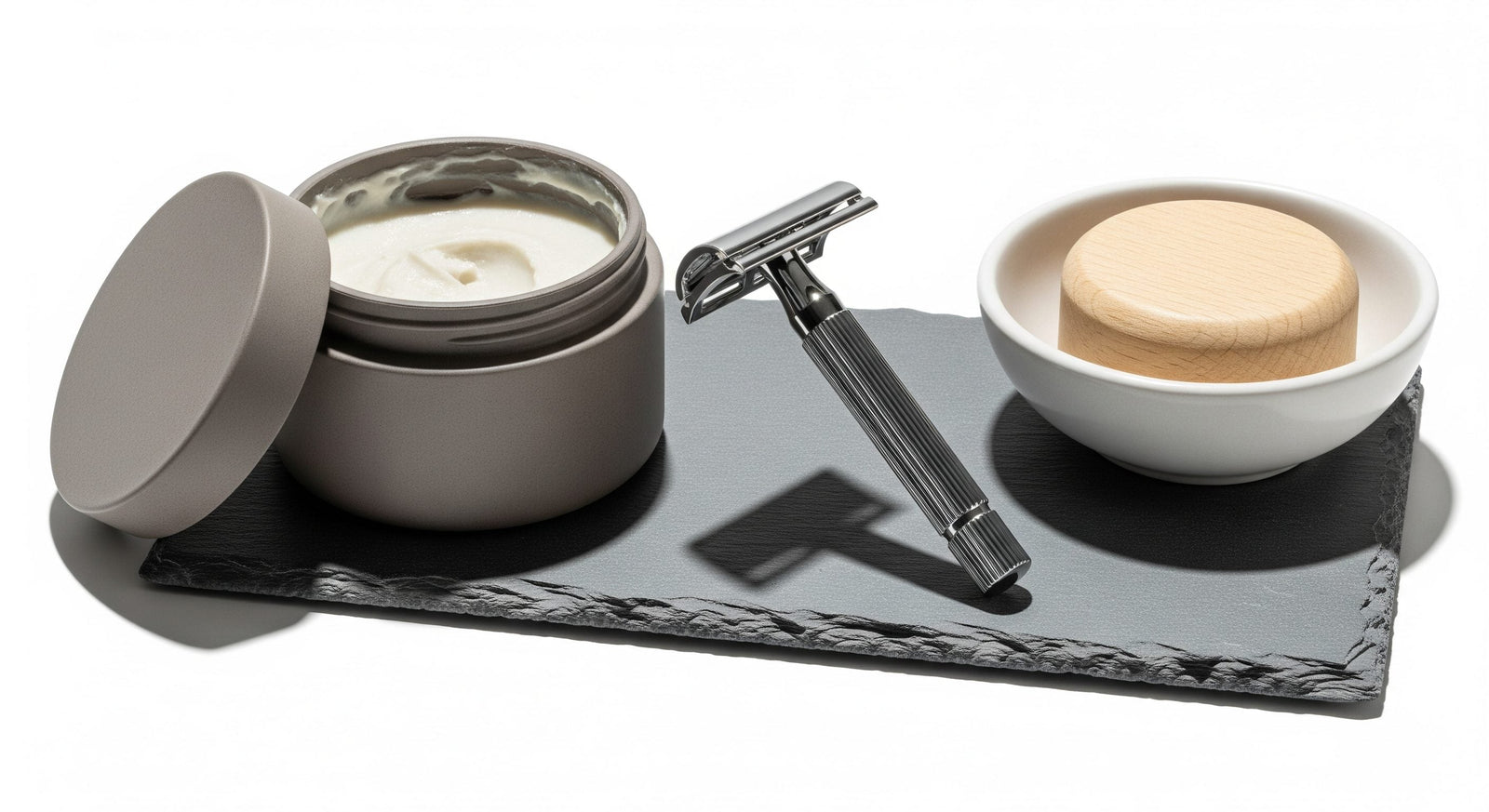 Man comparing affordable and luxury grooming products side by side in bathroom